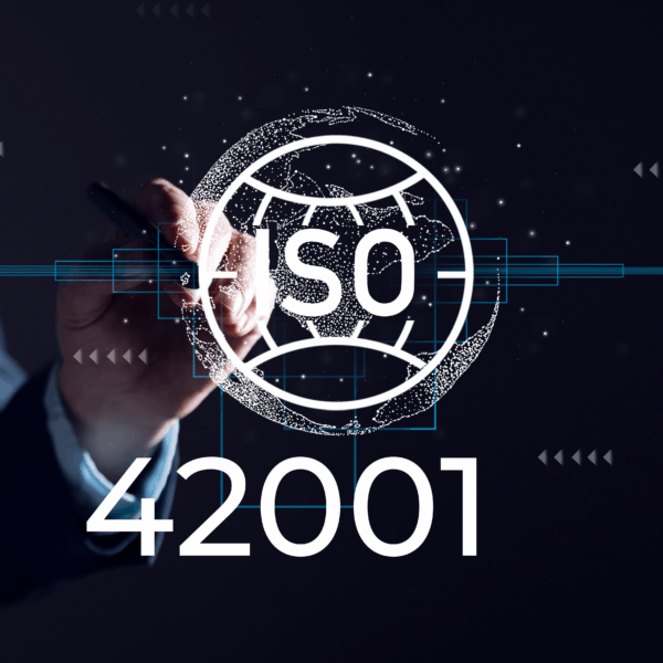 A consultant pointing to a digital display about working with an expert ISO 42001 consultant.